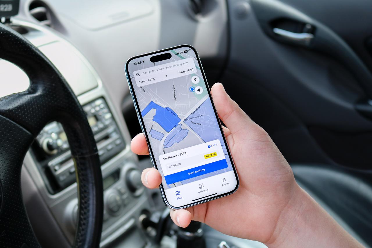 App on phone in car showing map